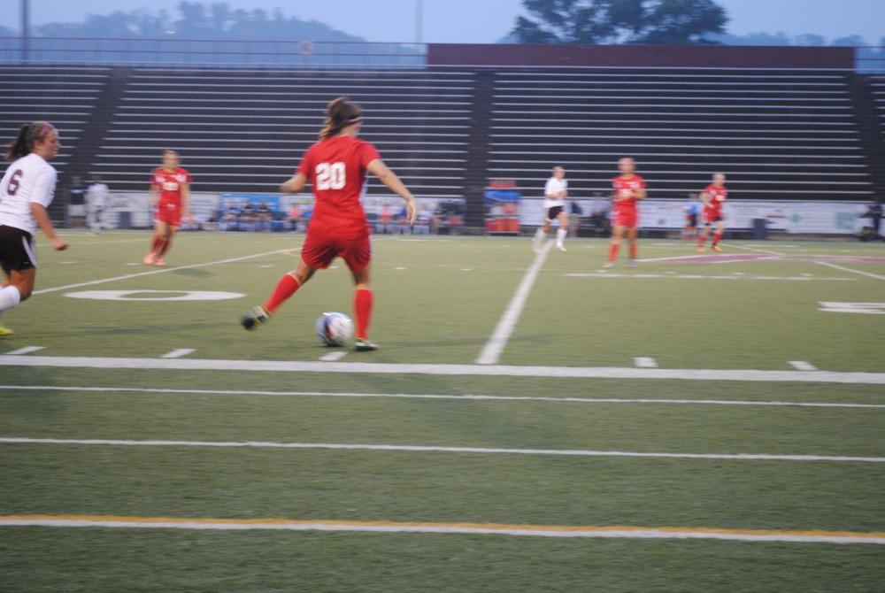 Junior Casey Spieler goes for the ball during an away game.