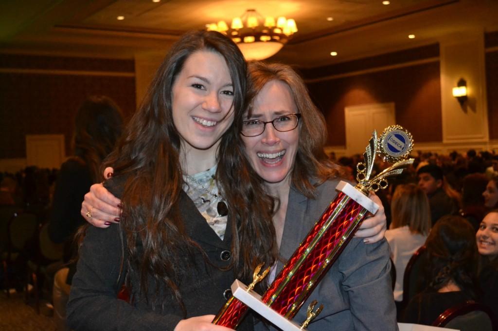 Senior Jennifer Wallis and Mrs. Beth Majors smile in excitement after Wallis places first in the state. 