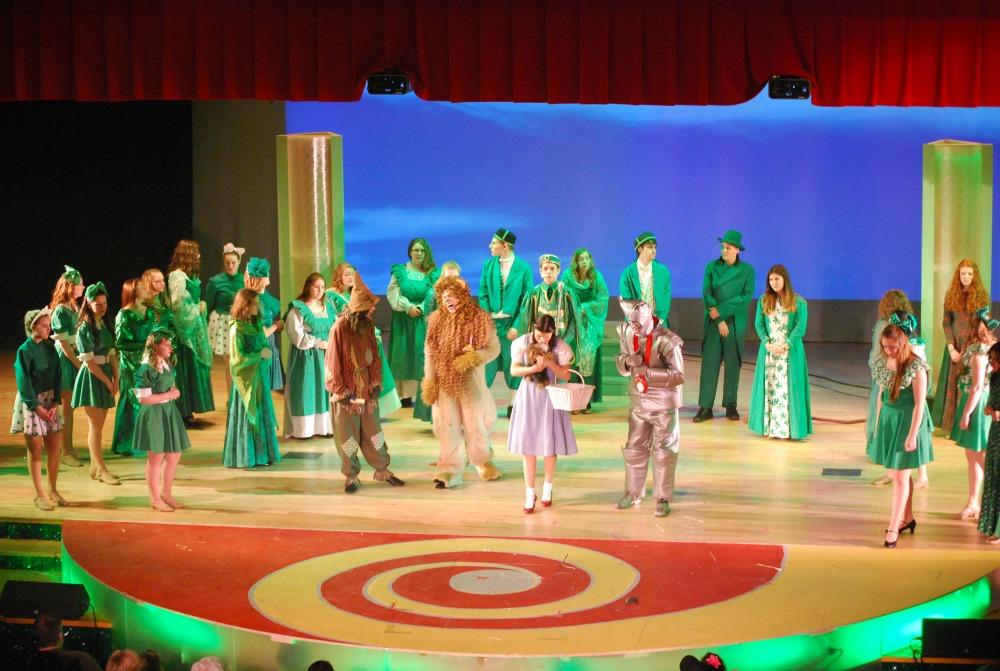 Members of the Drama Club come together to perform “The Wizard of Oz” for the 2014 musical at FHS.