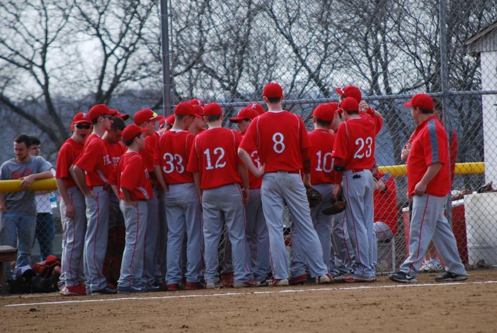 The high school baseball team huddles before a game against Quaker Valley on April 2.