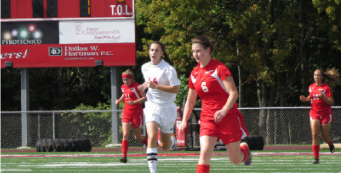 GIRLS SOCCER - Kicking into the new season: Girls Soccer starts season with new coach