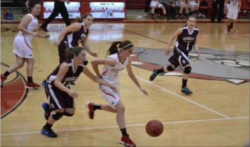 Tipping off the season: Girls’ basketball team begins with ‘bigger and better things’