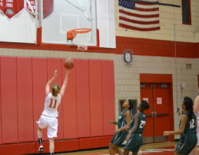 Defending a playoff spot: Girls’ basketball team extends their season