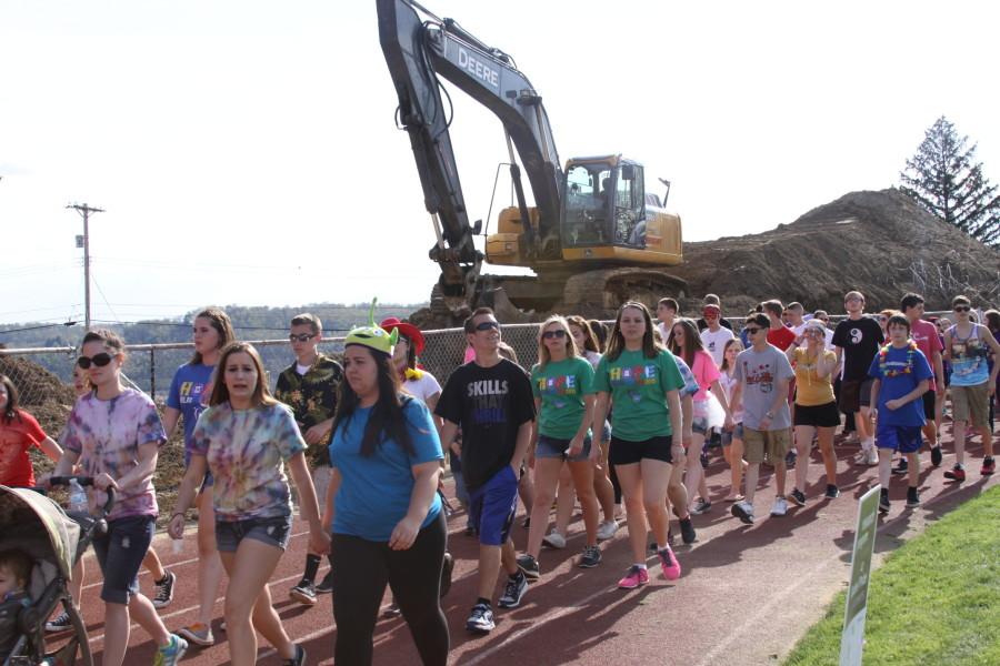 Cancer survivors walk the survivors lap during the Relay on May 2.