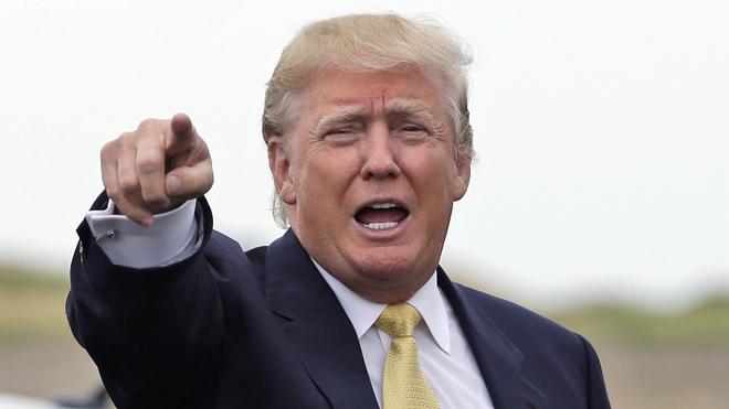 Republican presidential candidate Donald Trump arrives at a fundraising event at a golf course in the Bronx borough of New York, Monday, July 6, 2015. (AP Photo/Seth Wenig)