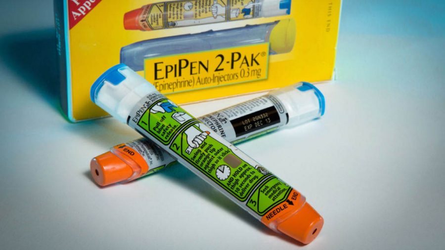 Examples of epinephrine pens that the Center for Disease Control and  Prevention guidelines recommend that schools stock to combat food allergies are photographed in the Washington Wednesday, Nov. 13, 2013. The deaths of two girls in Illinois and Virginia from severe food allergies have helped spur efforts to get schools to stockpile emergency medications that can save lives. That effort has now reached the highest level: President Barack Obama's desk. The president was expected to sign a bipartisan bill that offers a financial incentive to states if schools stockpile epinephrine, considered the first-line treatment for people with severe allergies. The medication is administered by injection, through preloaded EpiPens or similar devices. (AP Photo/J. David Ake)