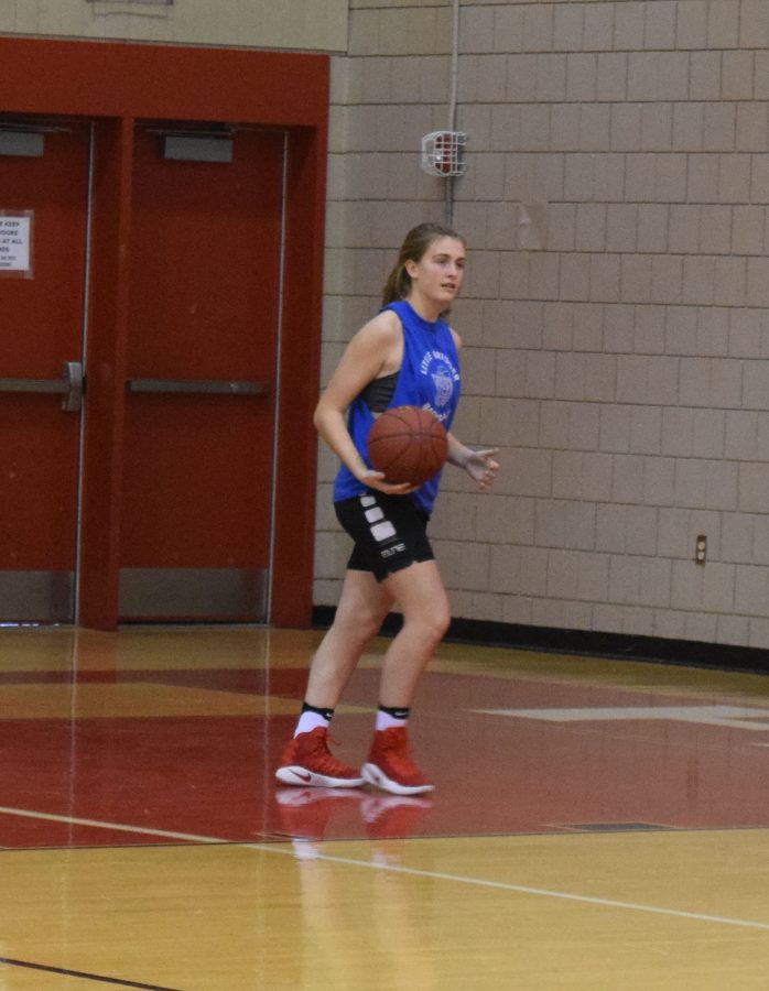 Freshman Myah Hrinko waits for the opportunity to shoot the ball at a high school practice.