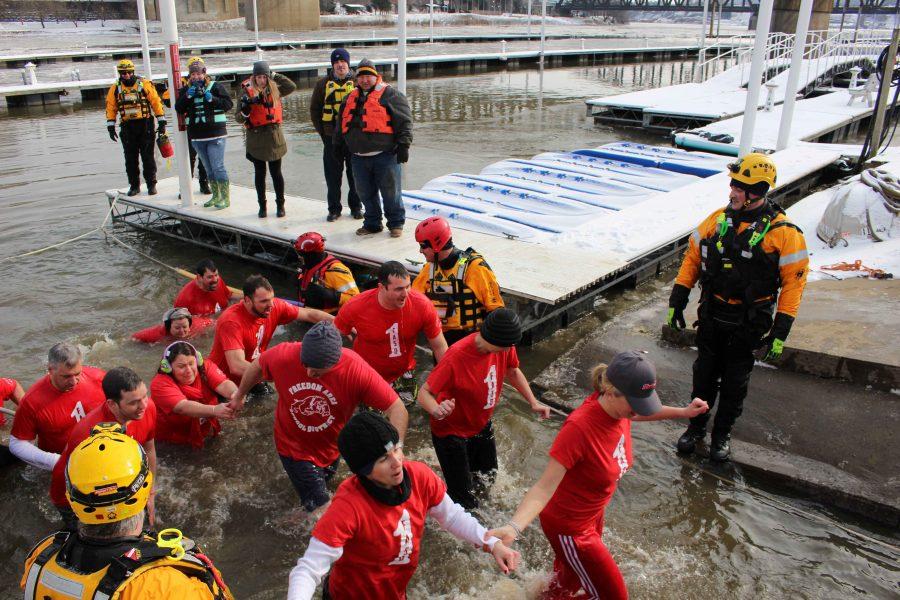 The Slush Puppies bear the cold waters of the Ohio River on Jan. 7 for the annual Special Olympics fundraiser. 