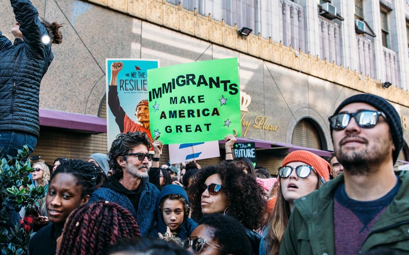 Pro-immigration supporters rally in a march this February
