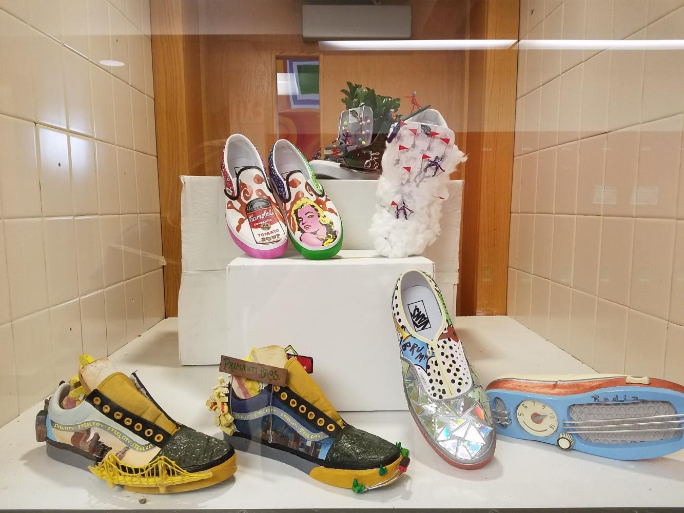 The shoes the participating FHS students designed are on display outside of the art classroom.

