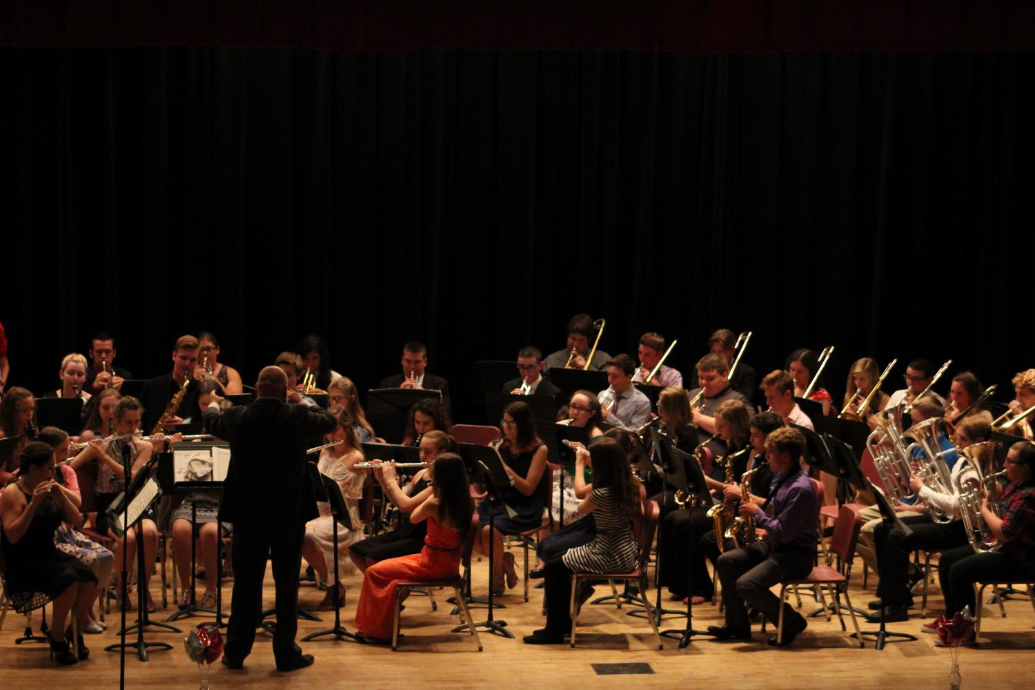 Band members perform during the Concert on May 18
