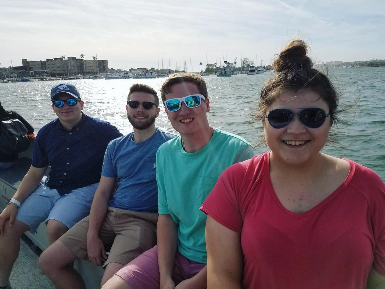 DECA members junior Daniel White, senior Avery Sayre, senior Devin Daley and junior Rachel DeCesaris ride the ferry in sunny Newport Beach, California.