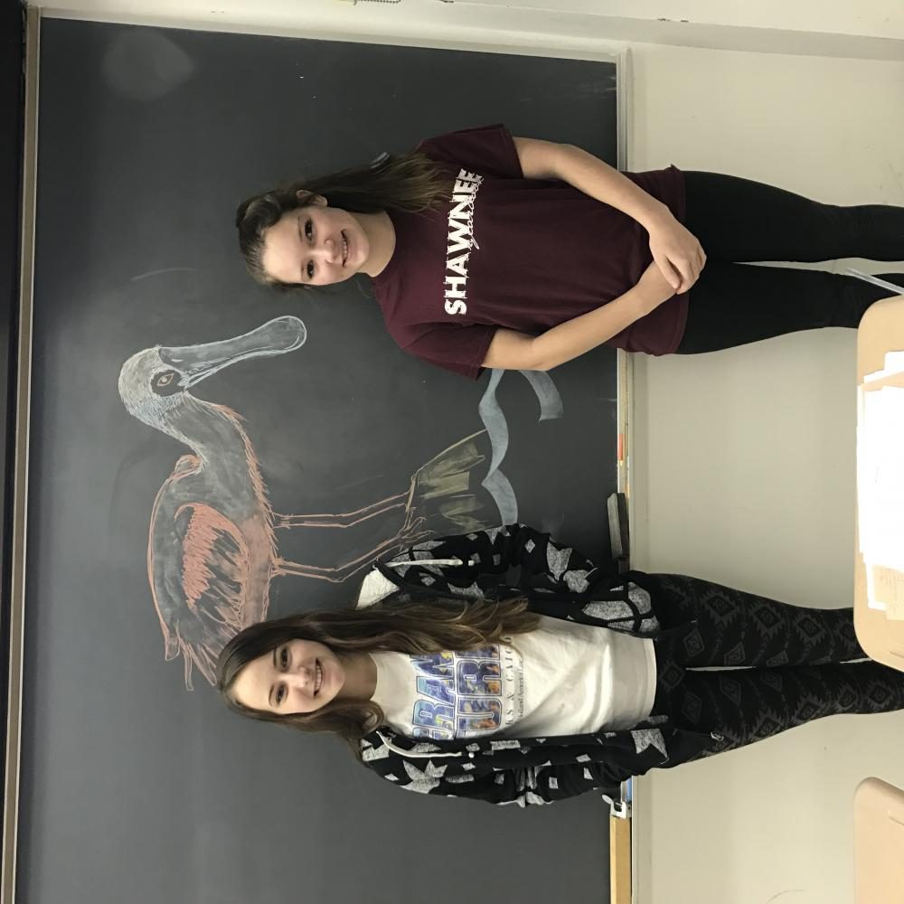 Seniors Breanna Leasure and Brianna McKee, two attendees of the Raptorthon, pose for a photo. 