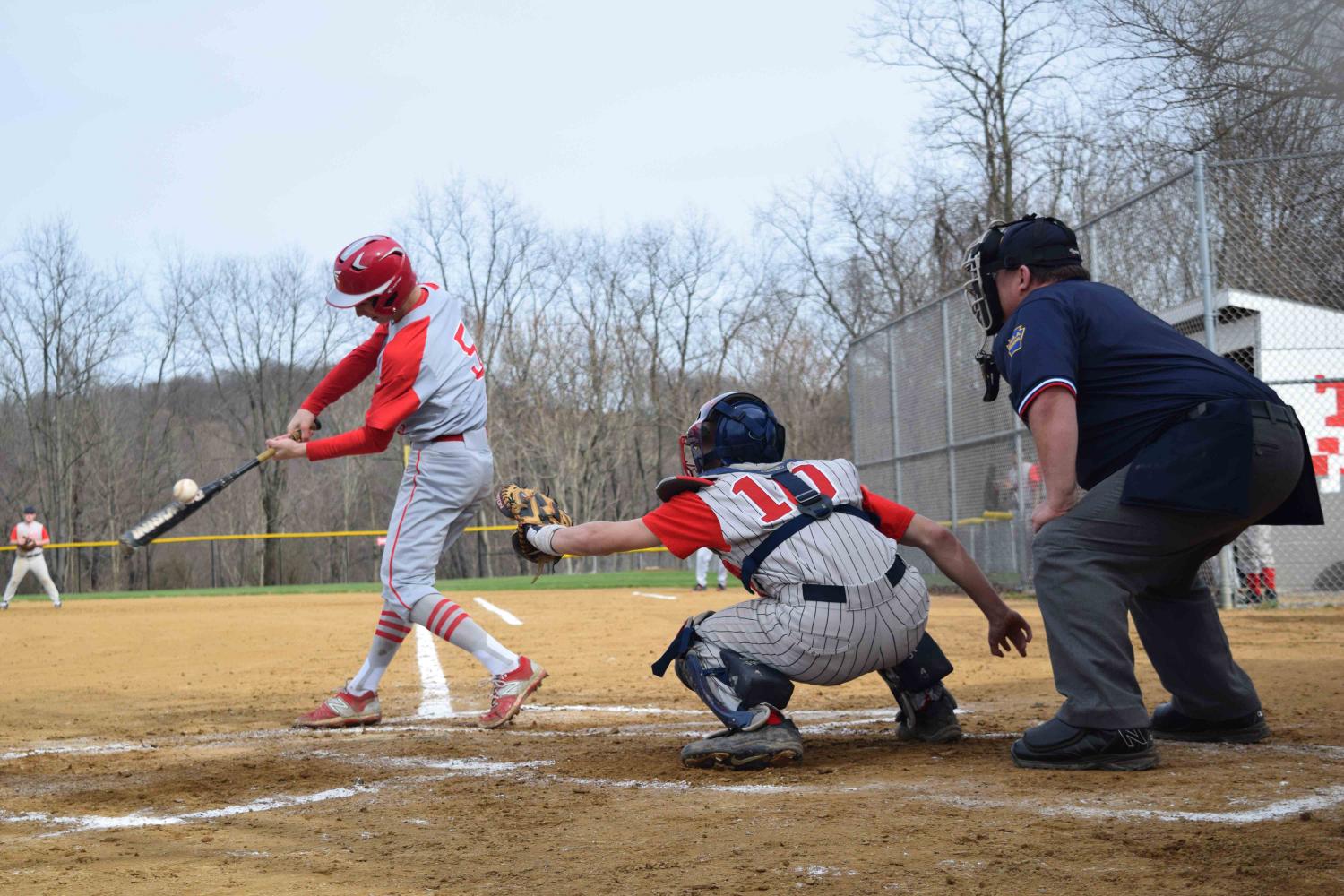  Sophomore Zach Rosa makes contact with the ball during the home game versus Summit Academy on April 5. 