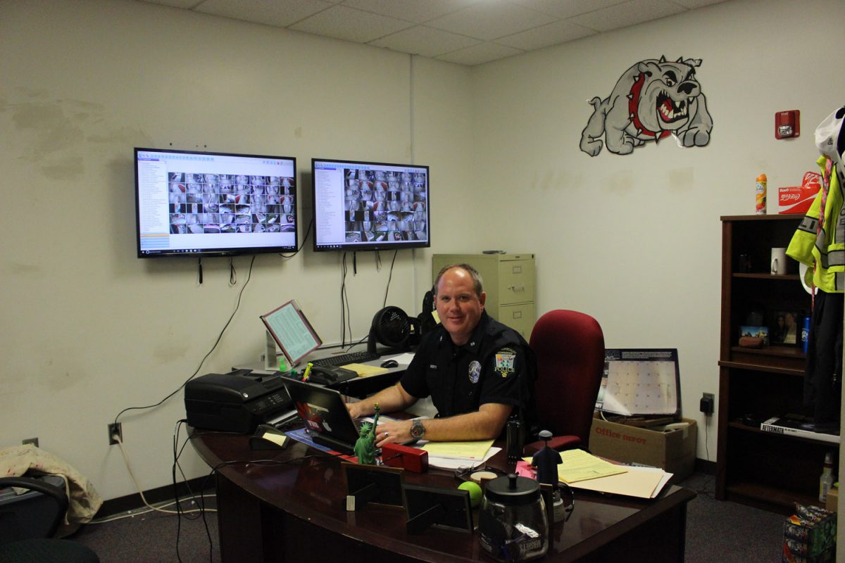 Resource Officer Tom Liberty sits at his desk in his new office space.