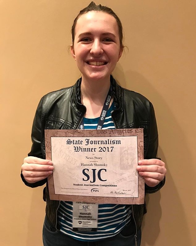 Alumnus Hannah Shumsky poses after winning first place for news writing in a PSPA competition in March 2017.