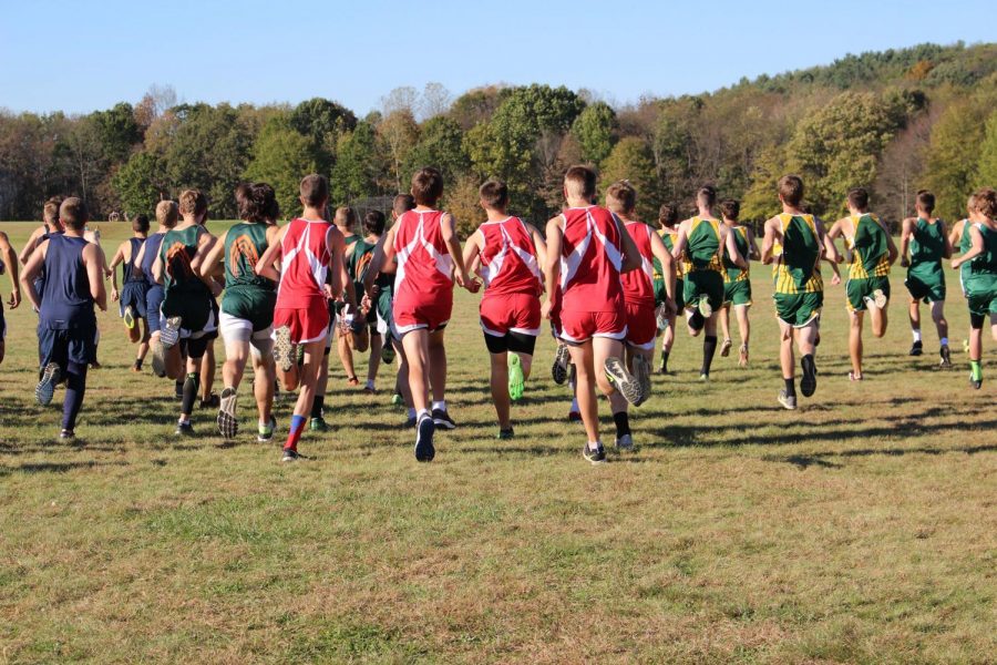 The+boys+varsity+team+begins+their+race+at+Freedom%E2%80%99s+home+course+Brush+Creek+Park+on+Oct.+18.