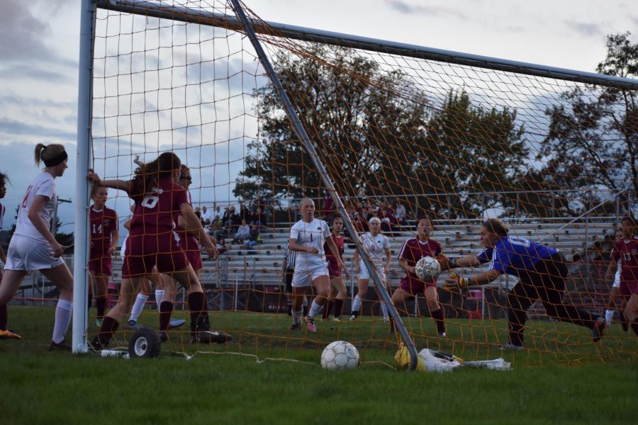 New Brighton senior, Lyndsee Monac scores a goal against Quigley on Oct. 12.