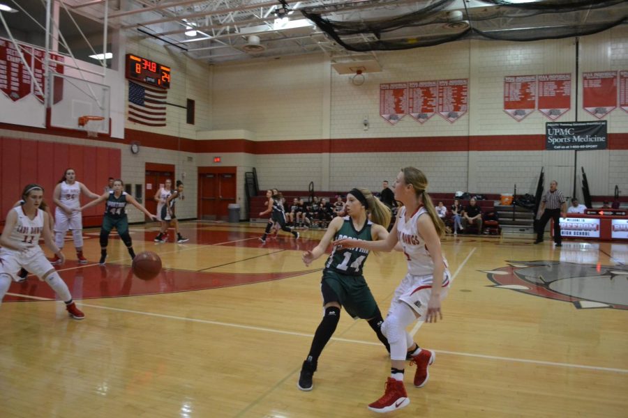 Sophomore Myah Hyrinko catches a pass from Morgan Swab.