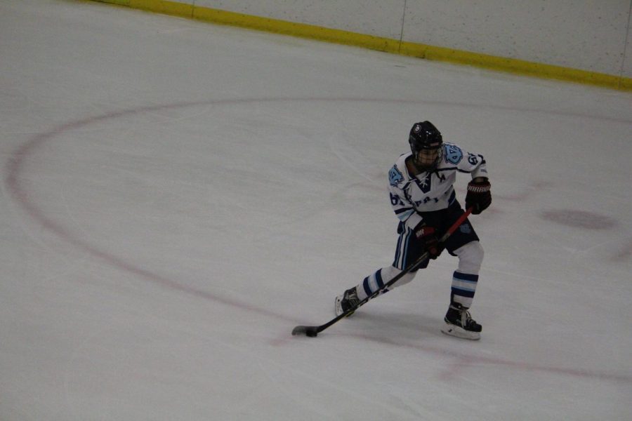 Senior Jimmy Kelly-Tindall winds up a shot to make it 2-0 in the first period against Elizabeth Forward.