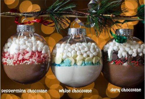  Three hot chocolate mix combinations hanging on a Christmas tree to display some possible combinations.