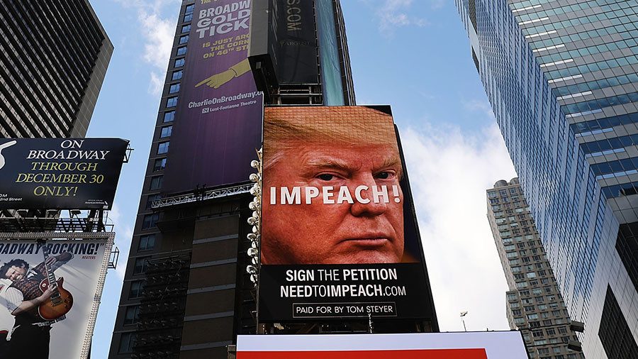 This billboard is part of Tom Steyer’s campaign to impeach President Donald Trump from office.