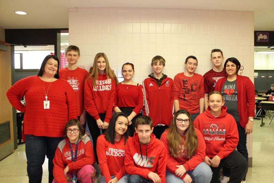  Ms. Andrea Niedbala, Ms. Maria Porter and ninth grade students wore red to show their support on Feb. 2.