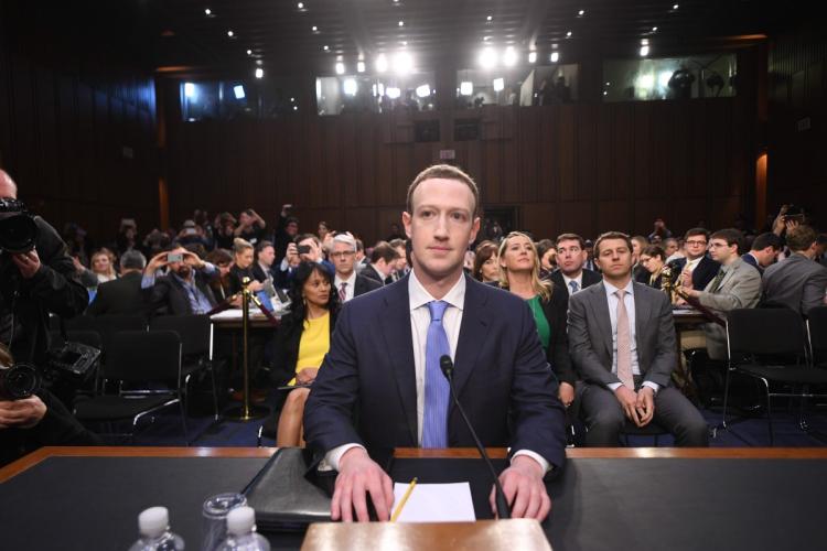 CEO of Facebook, Mark Zuckerberg (center), sits in front of 44 Senators on April 10, 2018, to give a testimony about the data scandal that affected millions of the social media platform’s users.