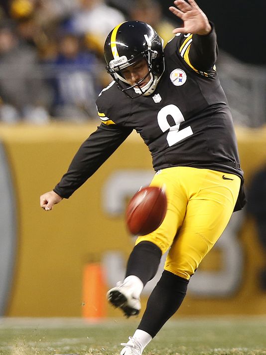 Former Steeler, Randy Bullock kicks the ball to start a NFL season game.
