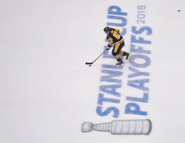 Pittsburgh+Penguins+captain+Sidney+Crosby+skates+across+the+playoffs+logo.