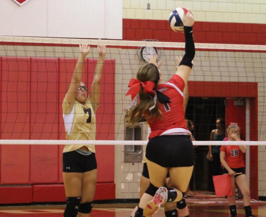 Senior Jenna Engel attacks the ball in an attempt to get a point against Chartiers-Houston on Sept. 4.