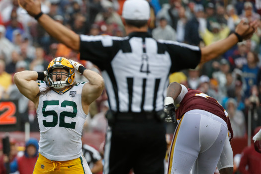 Green Bay Packers linebacker Clay Matthews (52) reacts to his penalty after tackling Washington Redskins quarterback Alex Smith during the second half of an NFL football game, Sunday, Sept. 23, 2018, in Landover, Md. (AP Photo/Alex Brandon)