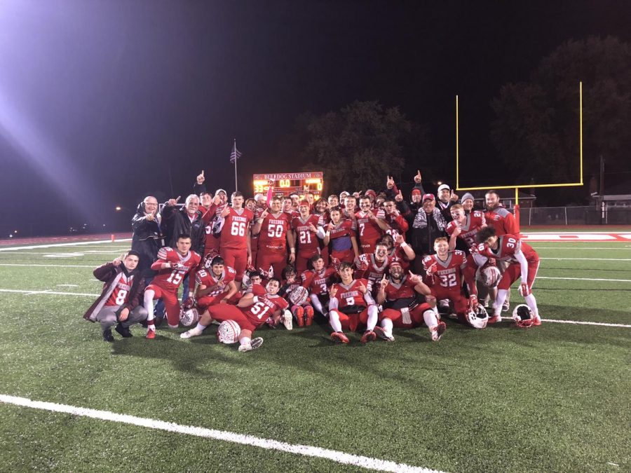 Players and coaches gather for group photo after defeating Western Beaver to conclude regular season and become co-section
champions with Mohawk. This was the first time the Freedom Football Team has won section since 1977.