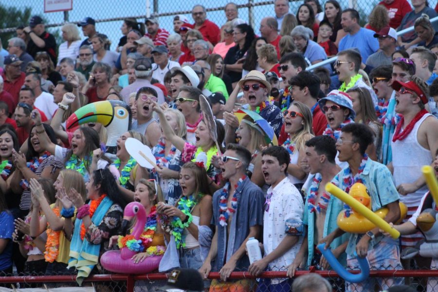 Students cheer on the football team as they prepare to stop Riverside on a crucial third down.
