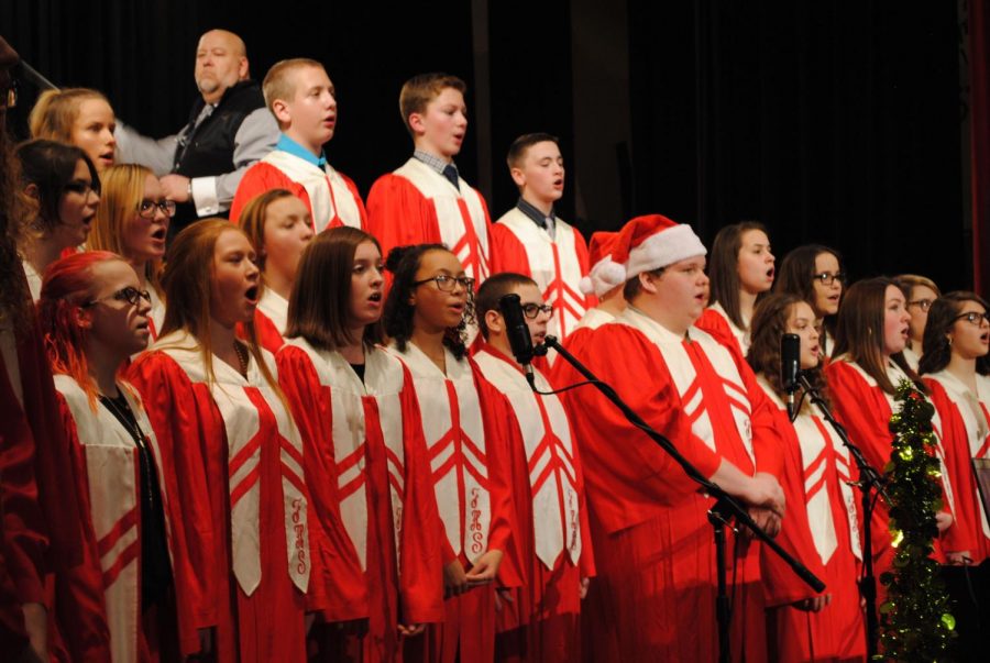 The FAHS choir joins the band in the concert’s finale, performing “He Shall Reign Forevermore.”