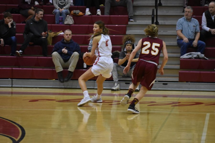 Senior Chloe Keller searches for a teammate to pass the ball to.