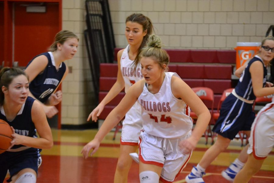 Senior Chloe Keller and sophomore Karissa Mercier watch the ball for an opportunity
to steal on a game against Burgettstown on Jan. 11. 