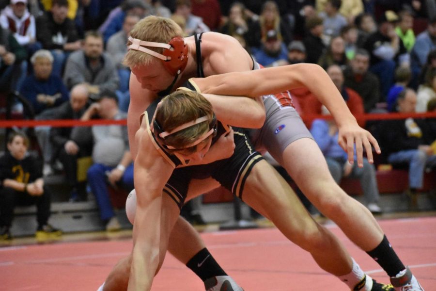 During the WPIAL Sub-Sectional Tournament, sophomore Trent Schultheis forces his opponent from Quaker Valley towards the mat, the match ending with another victory with a score of 8-0.