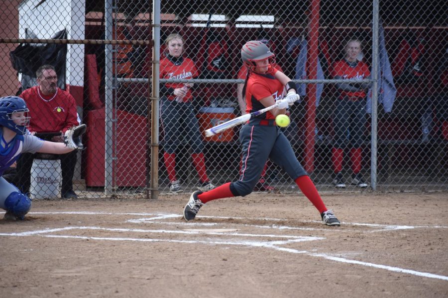 Sophomore Olivia Shaffer singles during the Bulldogs home game on March 19 against Avella.