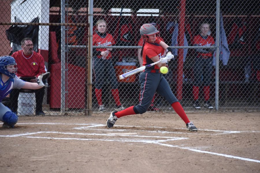 Sophomore Olivia Shaffer singles during the Bulldogs' home game on March 19 against Avella.