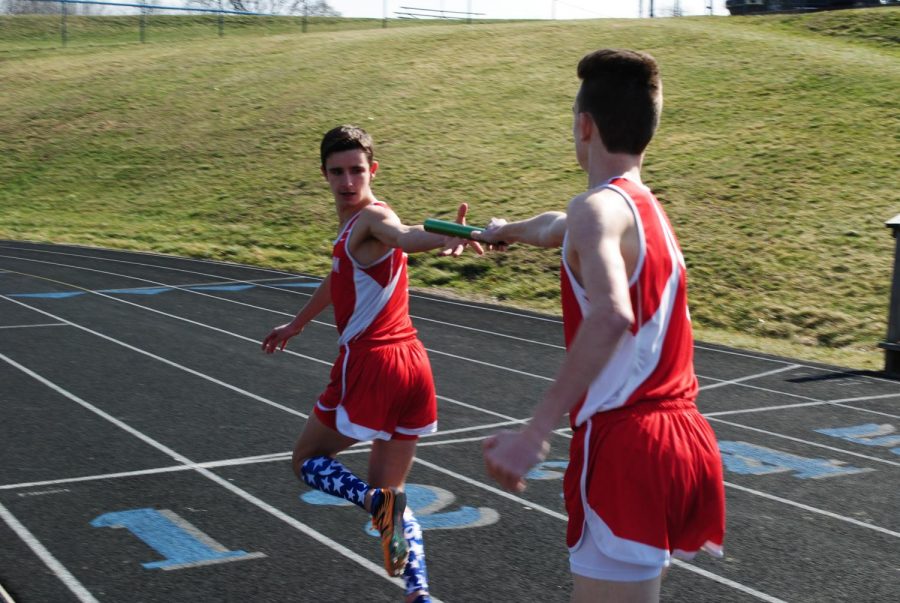 Then sophomore Ethan Paxton hands the baton to then senior Jarrett Boyd during a meet at Central Valley back in 2017.