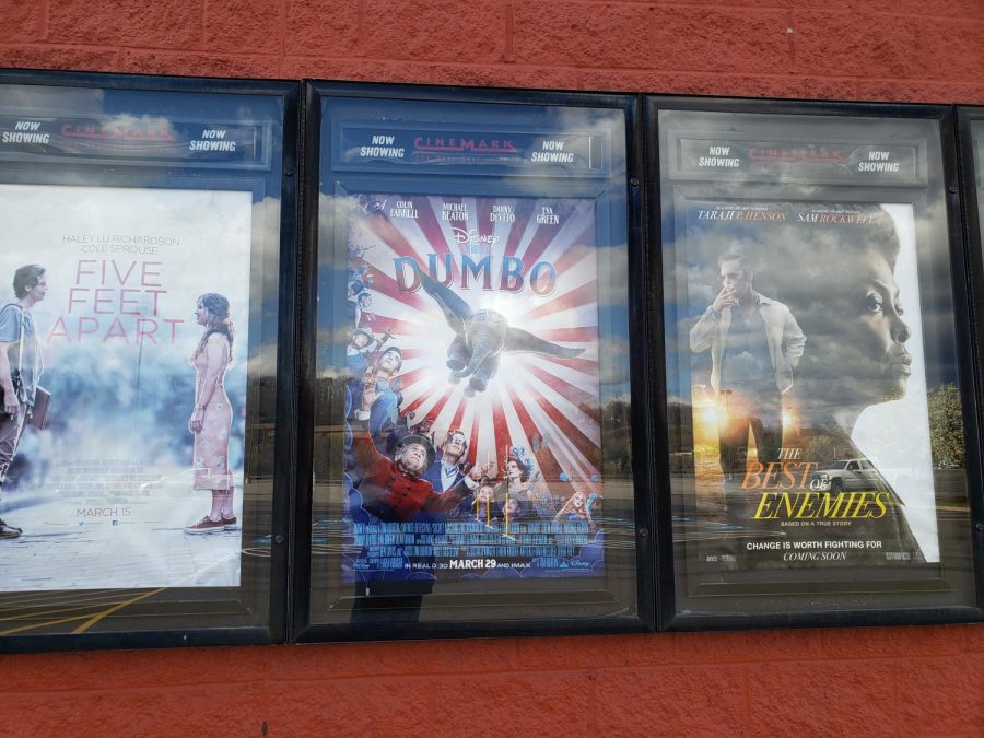 Showcased at the Monaca Cinemark, a poster for the new live-action remake of Dumbo, a timely classic, is displayed for movie-goers to see.