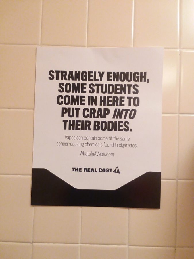 One of the many WhatsInAVape.com posters hang in and around of the men’s and women’s restrooms at the Freedom High School. 