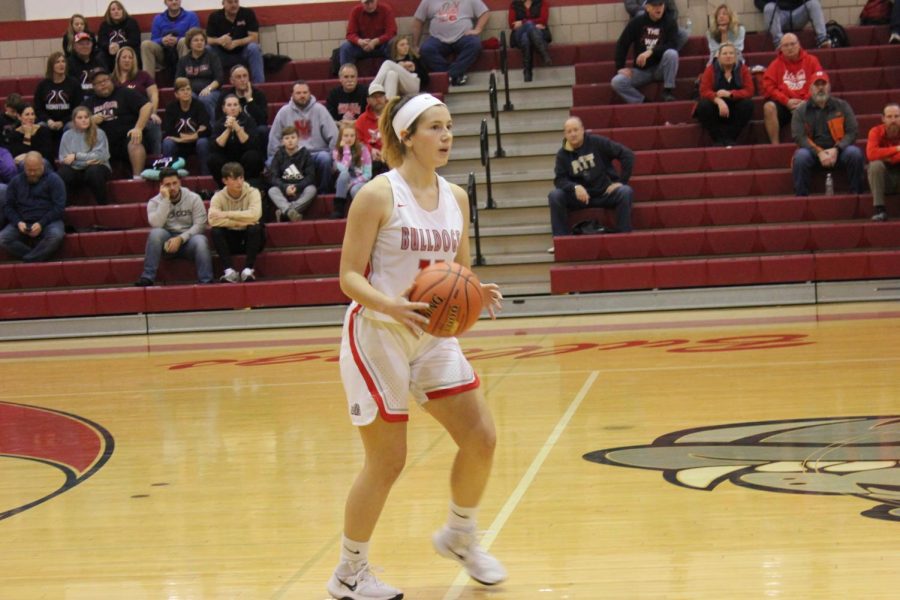 Sophomore Renae Morhbacher plans on how she will attack the Mohawk Warriors defense during a close match on Jan. 14
