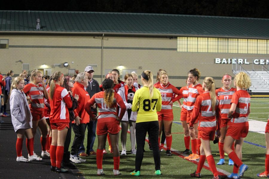 After their disappointing loss against Greensburg Central Catholic in the WPIAL playoffs, the team huddles around head coach Colin Williams to see what words of advice he has for the team going forward.