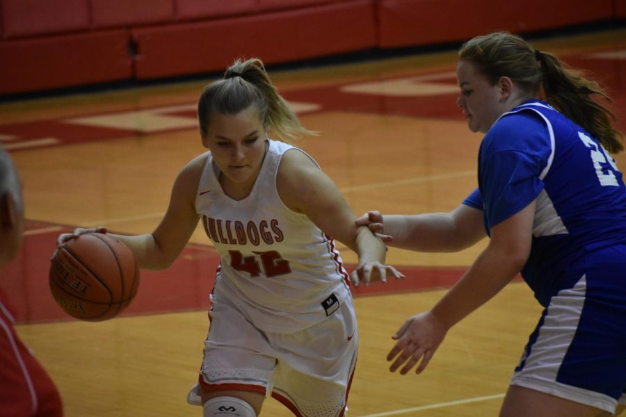 Sophomore Cadence Gorajewski dribbles the ball up the court in an attempt to score during a game against Ellwood.