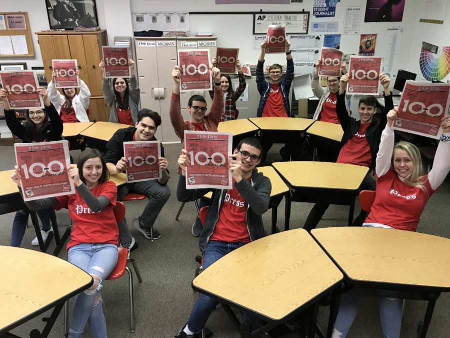 The 2019-2020 print media staff poses for a photo with the 100th issue of the FHS Press.
