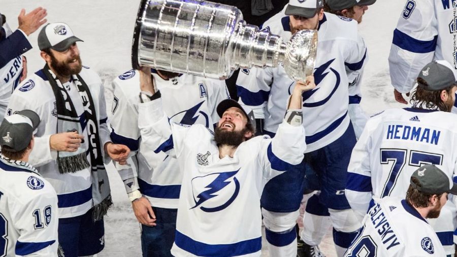 A+Tampa+Bay+Lightning+player+holds+the+Stanley+Cup+up+in+victory+after+the+Lightning+beat+the+Dallas+Stars+2-0+in+Game+Six+of+the+Stanley+Cup+Finals+on+Sept.+28.