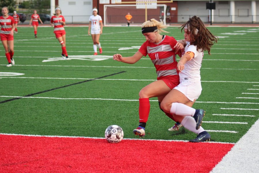 Junior Renae Mohrbacher powers past a defender as the Bulldogs defeat the Mohawk Warriors on Oct. 13.