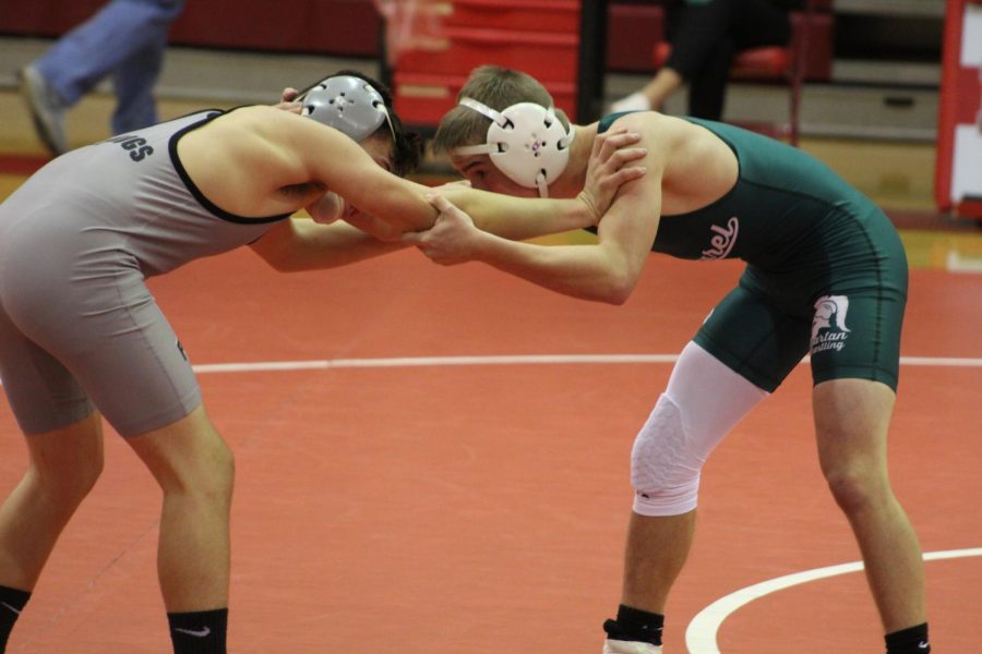 Sophomore Tanner Millward faces his opponent in a tournament against the Laurel Spartans last season.
